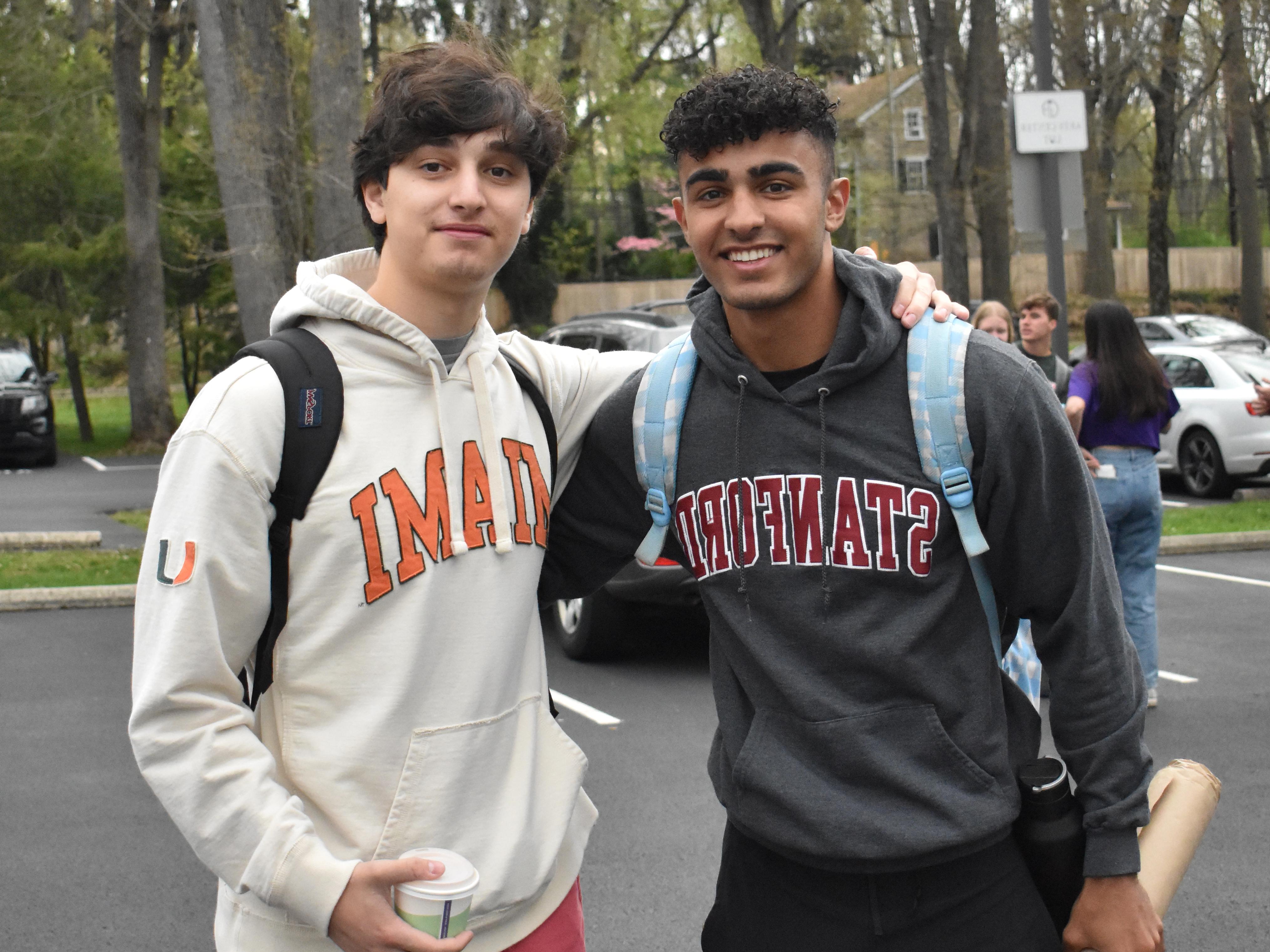 High school students get ready for graduation as they wear their prospective college in Philadelphia